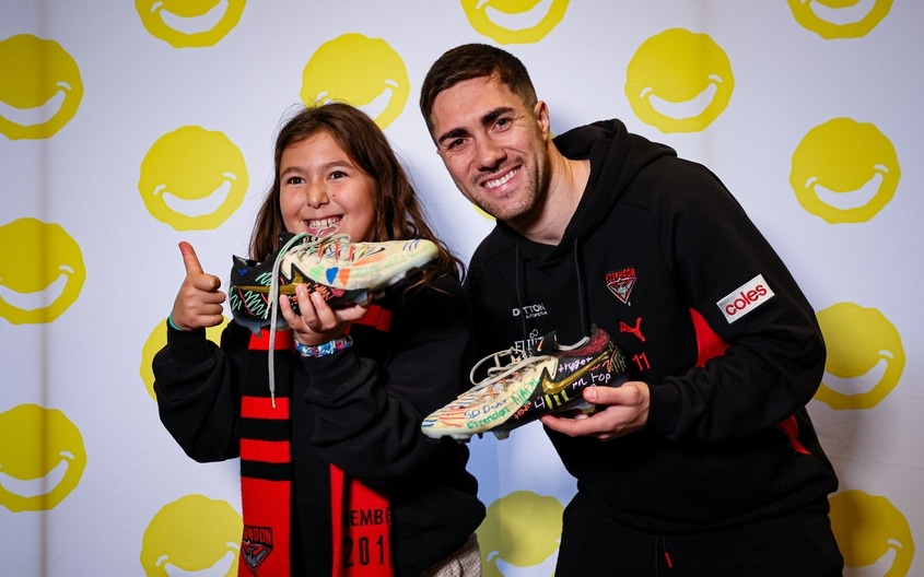 Images from Essendon's boot painting session with Challenge. (Photo: Essendon FC)