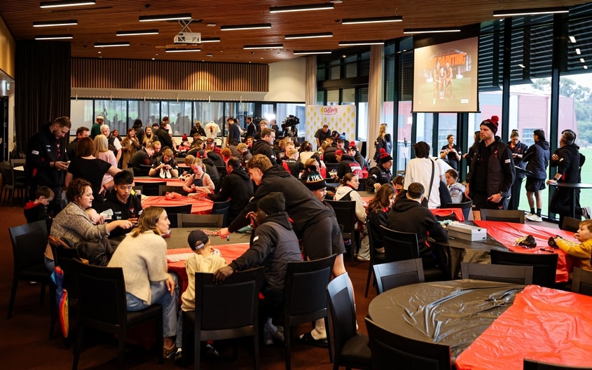 Images from Essendon's boot painting session with Challenge. (Photo: Essendon FC)