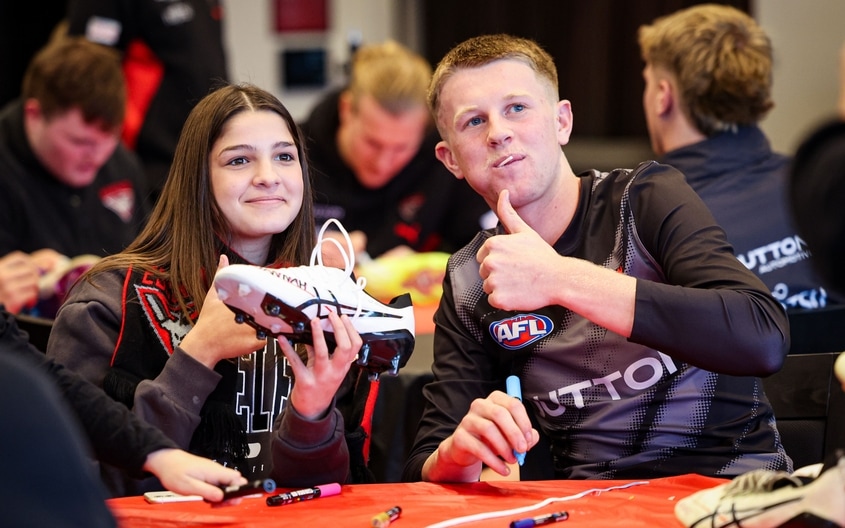 Images from Essendon's boot painting session with Challenge. (Photo: Essendon FC)
