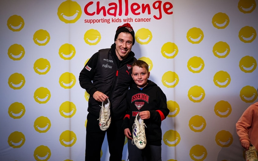 Images from Essendon's boot painting session with Challenge. (Photo: Essendon FC)