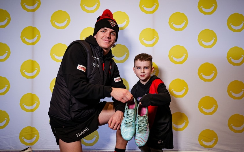 Images from Essendon's boot painting session with Challenge. (Photo: Essendon FC)