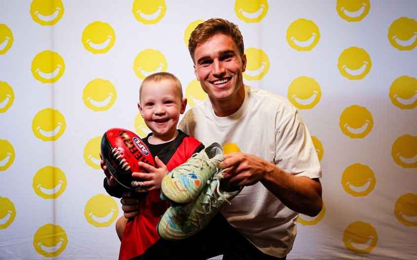 Images from Essendon's boot painting session with Challenge. (Photo: Essendon FC)