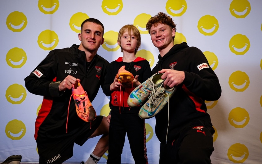 Images from Essendon's boot painting session with Challenge. (Photo: Essendon FC)