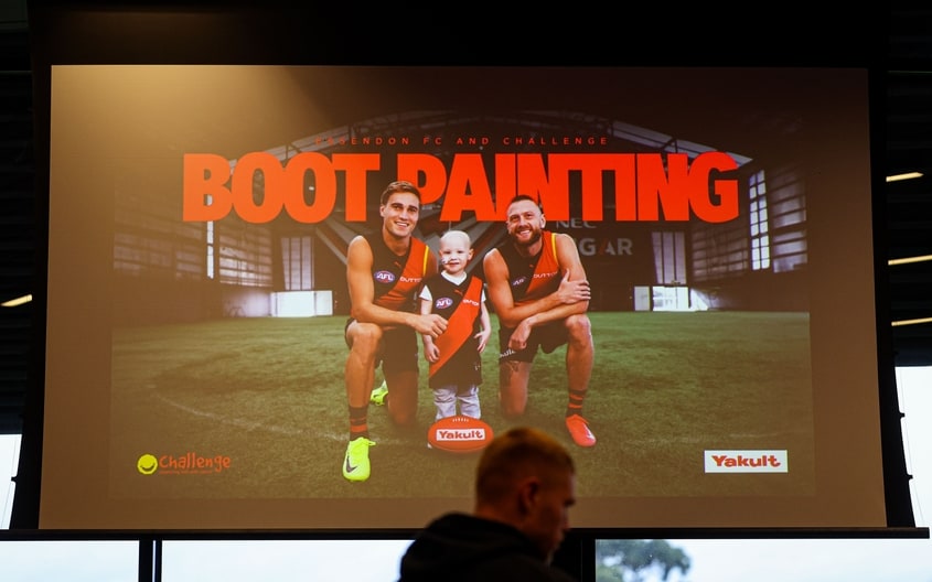 Images from Essendon's boot painting session with Challenge. (Photo: Essendon FC)