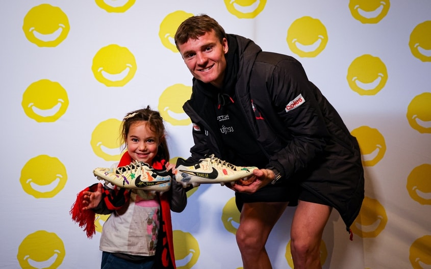 Images from Essendon's boot painting session with Challenge. (Photo: Essendon FC)
