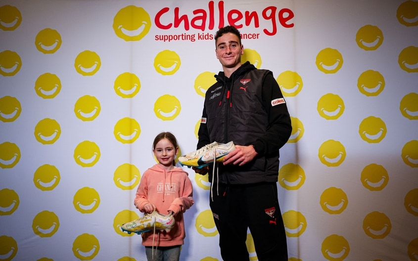 Images from Essendon's boot painting session with Challenge. (Photo: Essendon FC)